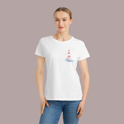 woman wearing a white organic cotton t-shirt with basque coast lighthouse design in the front